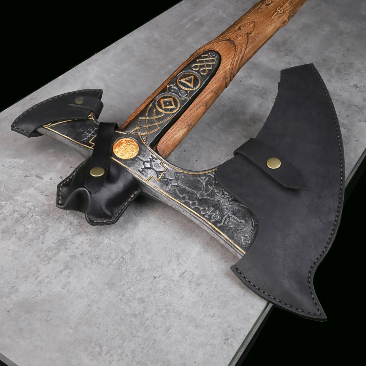 Handcrafted Leviathan axe with leather cover and glow in the dark runes