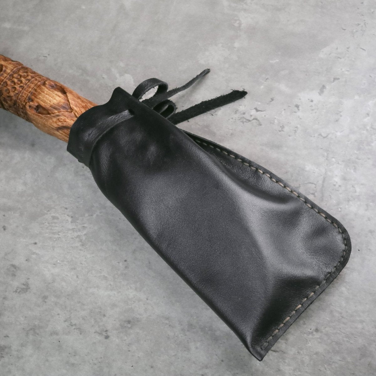 Handcrafted Leviathan axe with leather cover and glow in the dark runes