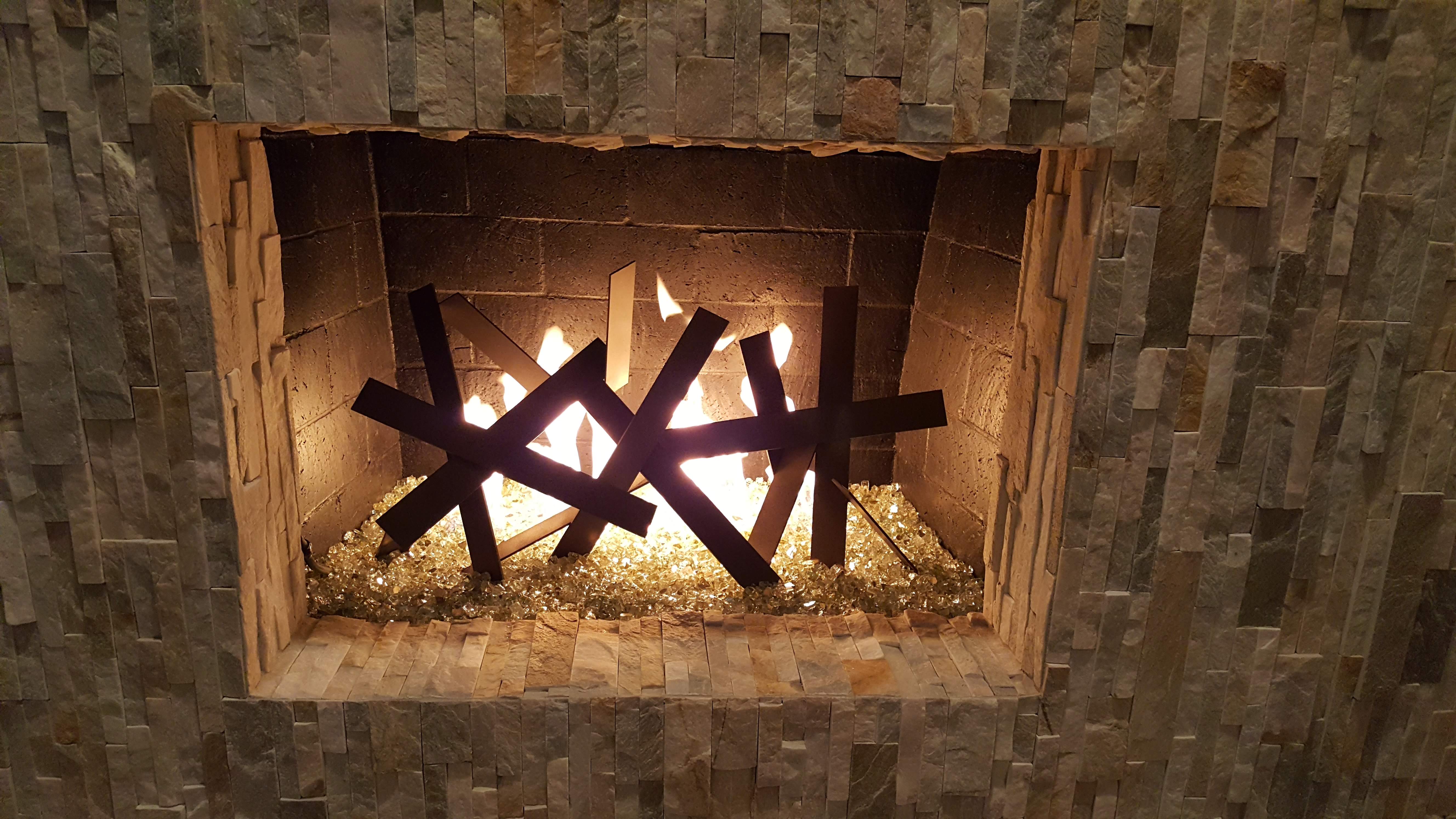 Fire Features for Every Occasion: Seasonal Decor Ideas - Abstract Flat Bar fire art feature by Eric Tolbert