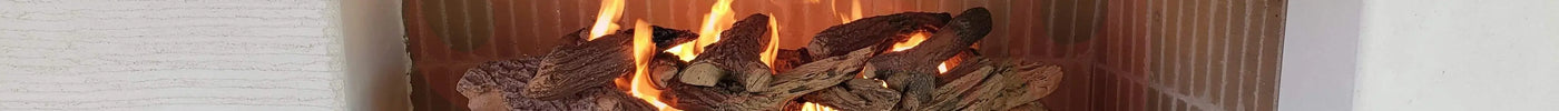 The Best Wood and Fuel Types for Your Fire Feature | Floating Log Grate by Eric Tolbert