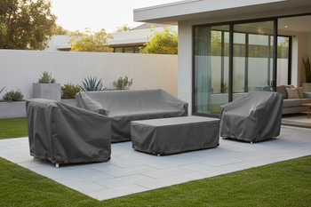 Outdoor Furniture Covers - 4-piece patio furniture set protected by 4-piece patio furniture cover in backyard with uncovered patio