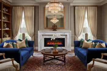 Electric Fireplaces: Plug In, Chill Out, Look Cool -  Electric fireplace inside a posh family room with lavish furniture