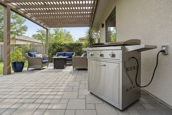 Electric Grills for Indoor & Outdoor Cooking -  freestanding electric griddle under a patio