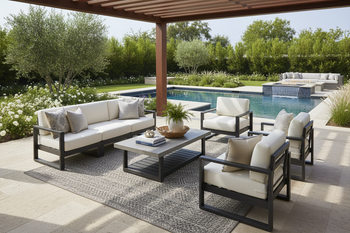 Patio Furniture Sets: Outdoor Seating That Slaps -  High end patio furniture set in an upscale backyard under a pergola