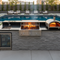 Grills & Cookers: Outdoor Cooking Done Right - outdoor kitchenette island with open grill and pizza oven