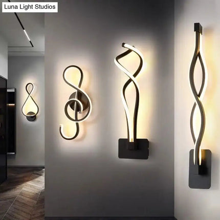 Minimalist Line Art LED Sconce - Black Metal Wall Lamp Decorbites